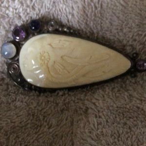 Carved bone and silver goddess pendant/brooch